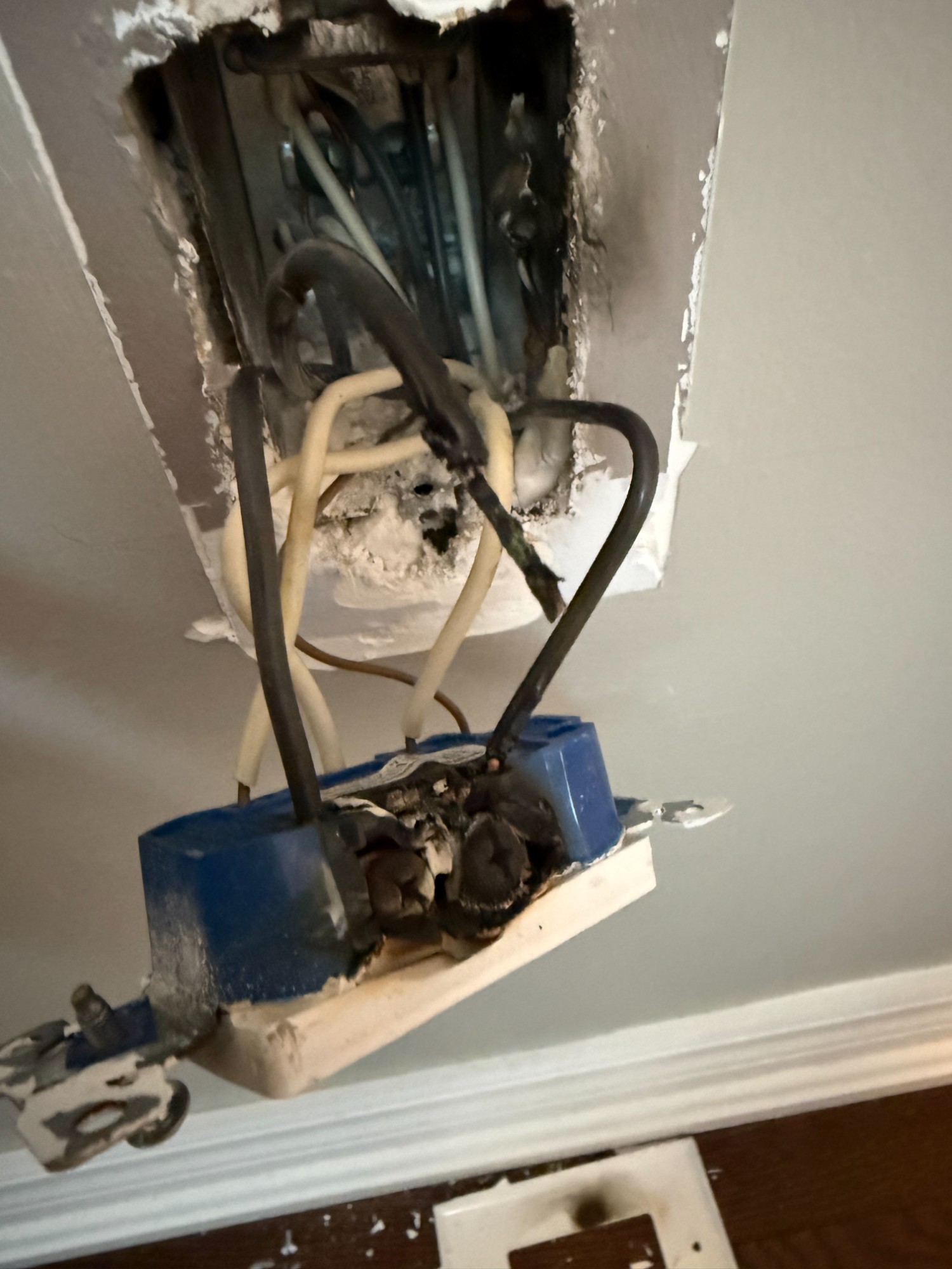 Electrical arcing and fire damage inside outlet box found during emergency inspection Toronto