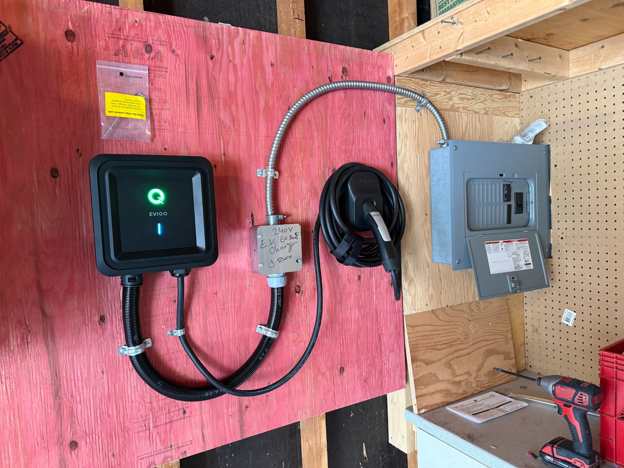 EVIQO Level 2 EV charger installed in Toronto home by Safe Electrical Solutions licensed electrician