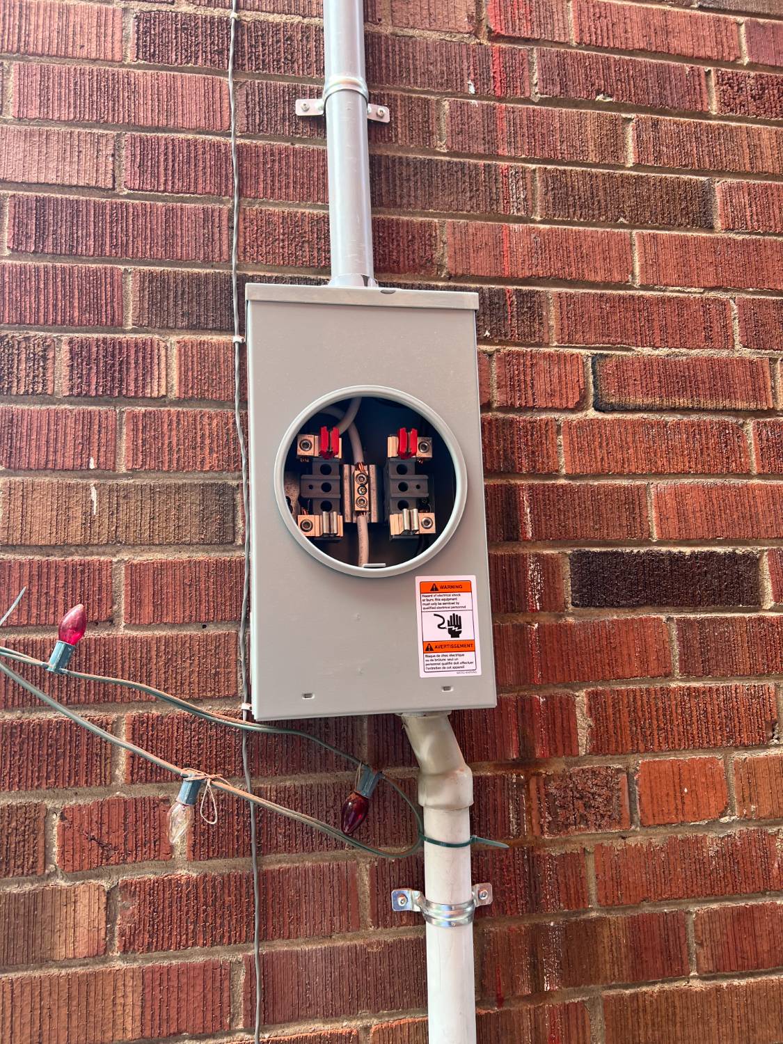 New meter socket installation with weatherproof conduit completed by Safe Electrical Solutions in Toronto