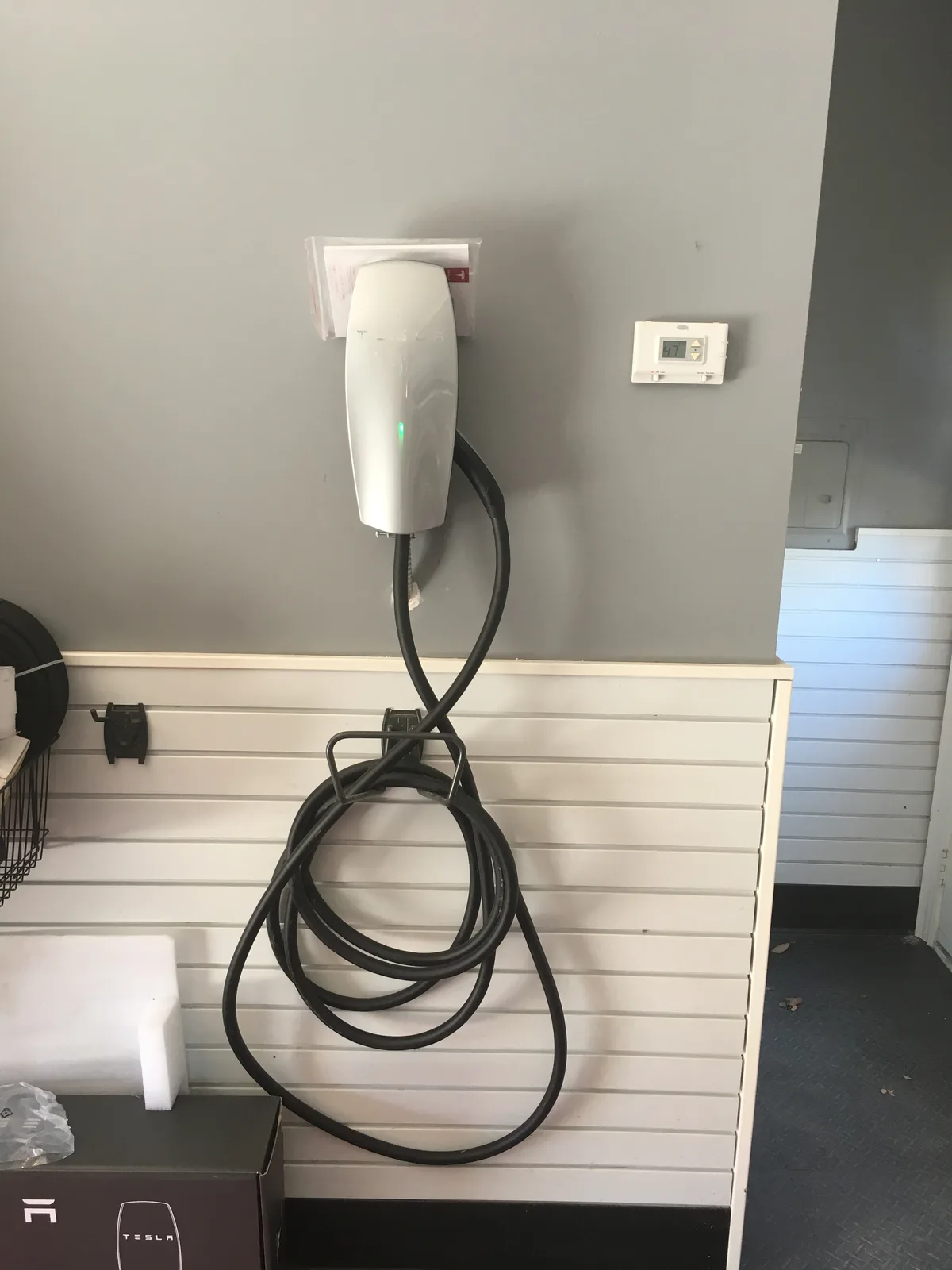 Level 2 EV charger installed on garage wall Toronto